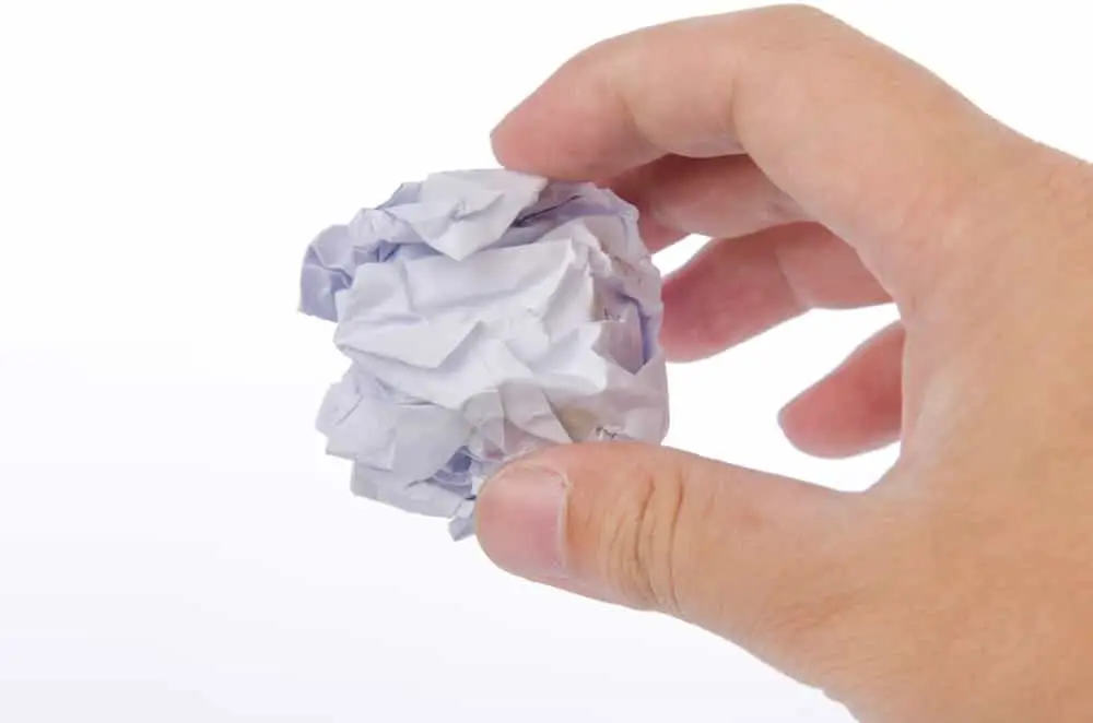 Kid throwing paper ball