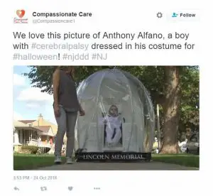 Boy with cerebral palsy dressed as Lincoln monument