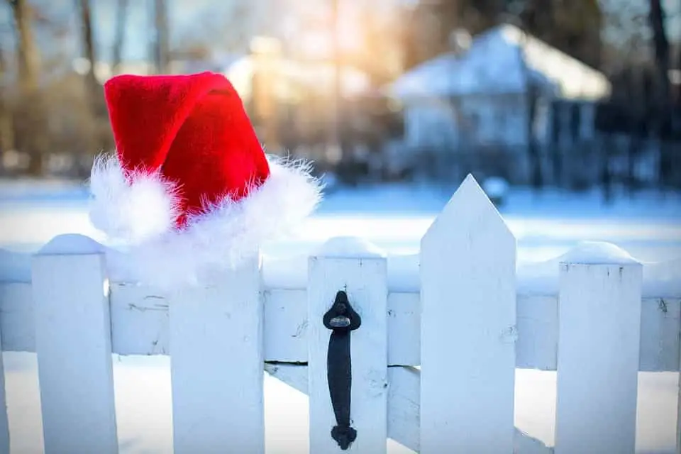 Santa hat hanging on fence