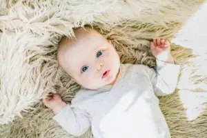 baby lying on back